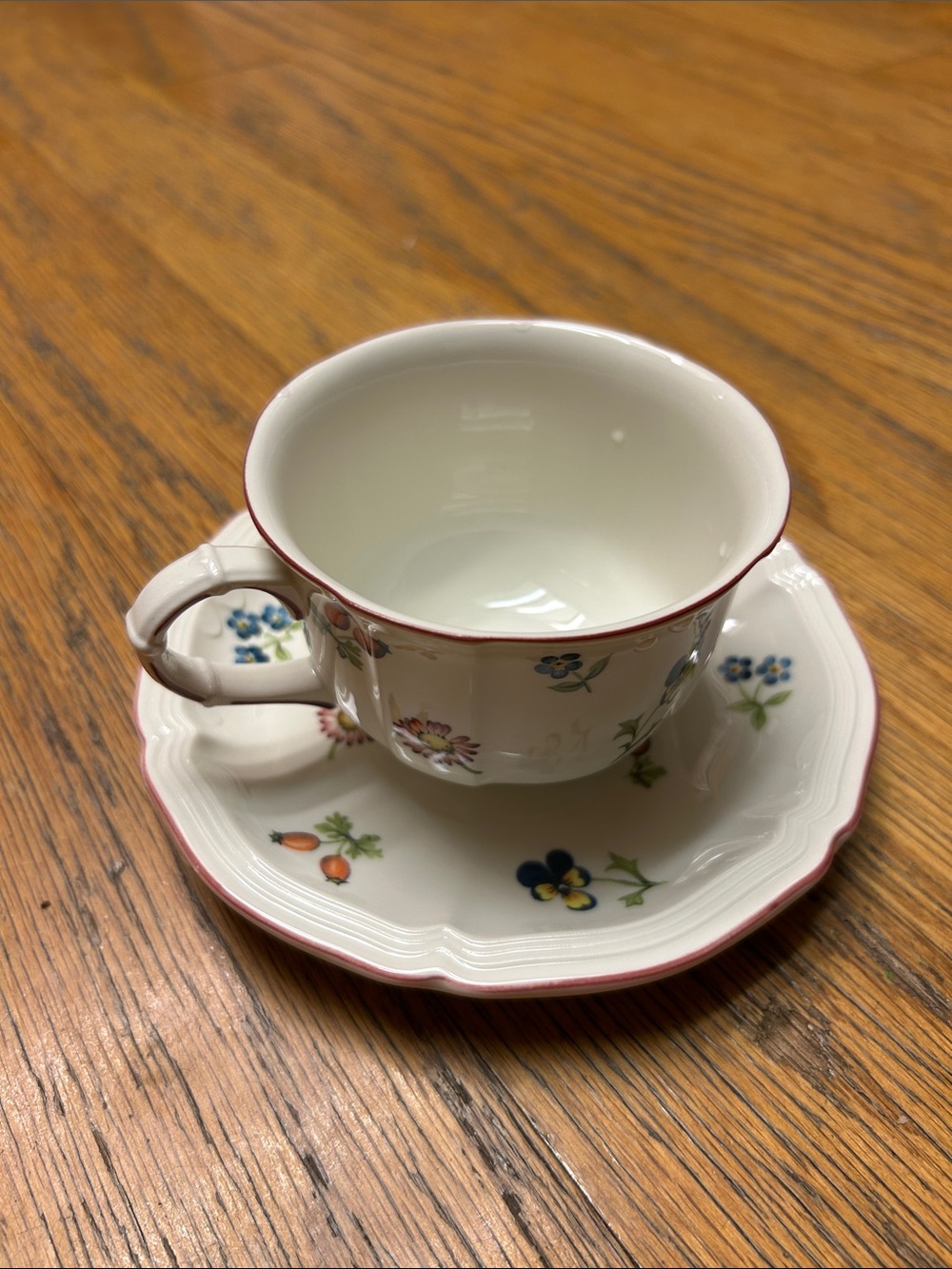 White Floral Porcelain Teacup and Saucer with Pink Trim